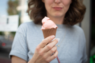 Young woman with an ice cream cone in Munich.