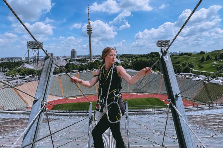 Linda Mutschlechner stands on the roof of the Olympic Stadium in Munich during the Olympic Tent Roof Tour.