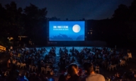 Open Air Cinema Kino, Mond und Sterne in Munich's Westpark by night.