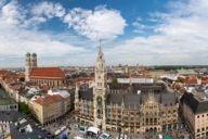 Panoramic view of the Neues Rathaus in Munich with the Frauenkirche in the background.